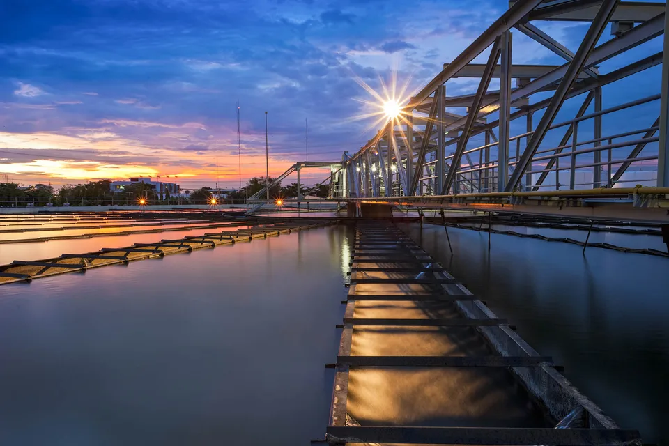 Water treatment infrastructure at sunset
